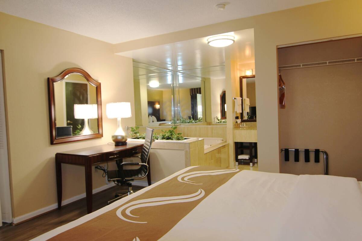 Suite, 1 King Bed with Sofa bed, Non Smoking | Iron/ironing board, WiFi (free), bed sheets