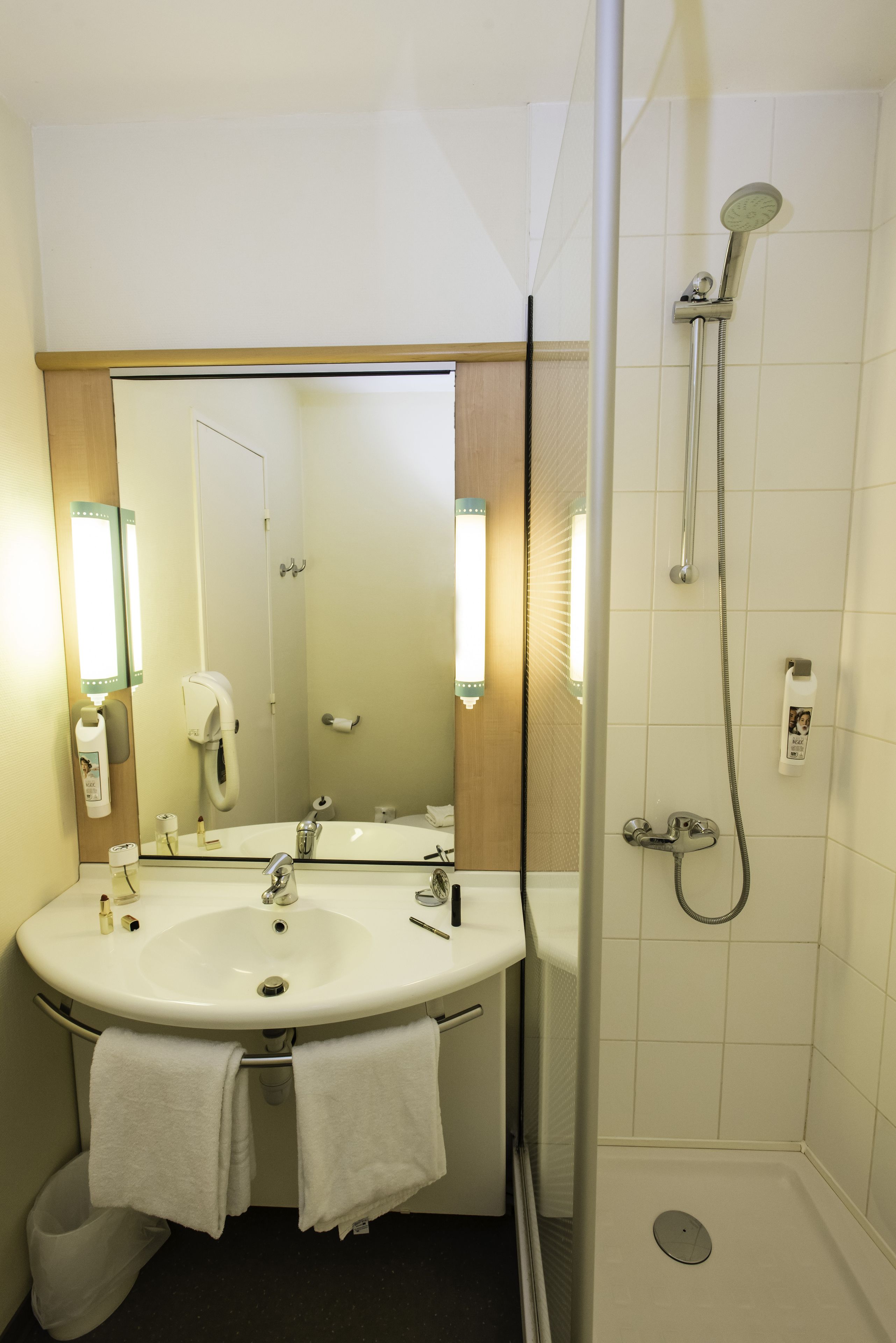 shower, eco-friendly toiletries, hair dryer, towels