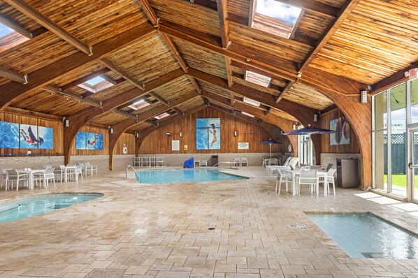 Indoor pool, open 6:00 AM to midnight, pool loungers