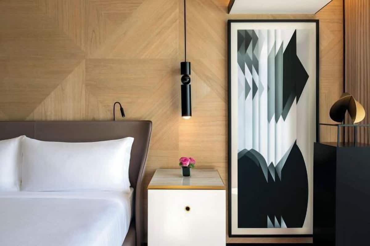 Premium bedding, free minibar items, in-room safe, desk