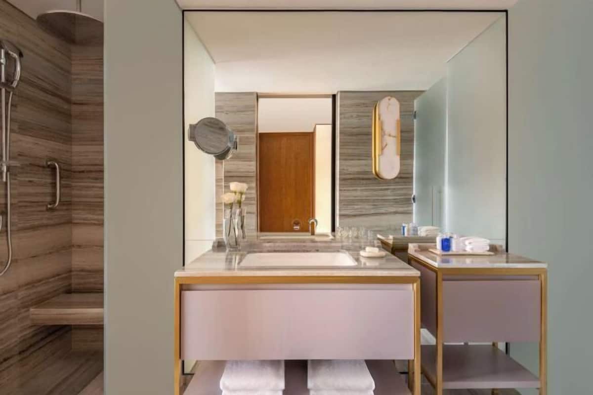 Rainfall showerhead, eco-friendly toiletries, hair dryer, bathrobes