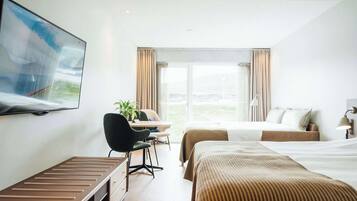 Studio | Premium bedding, desk, laptop workspace, iron/ironing board