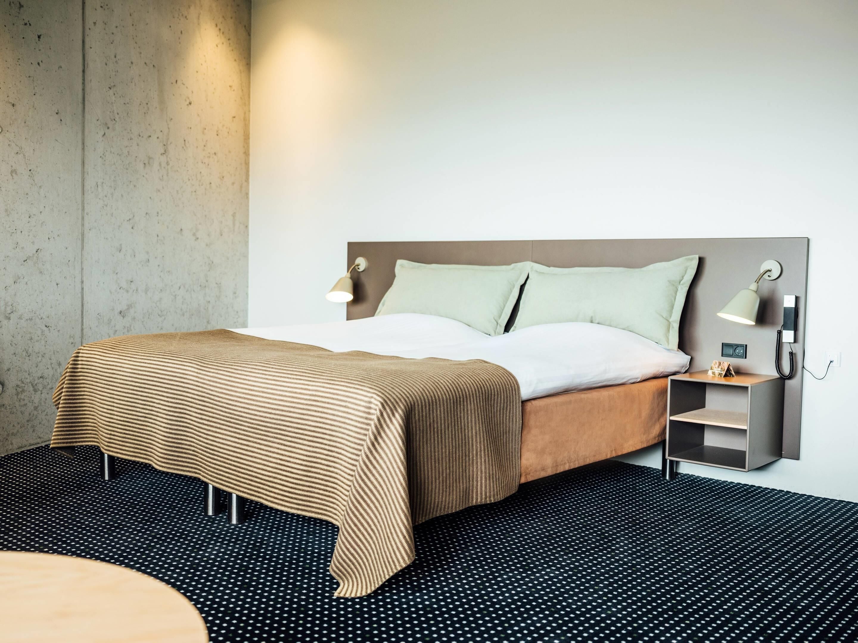 Family Room | Premium bedding, desk, laptop workspace, blackout drapes