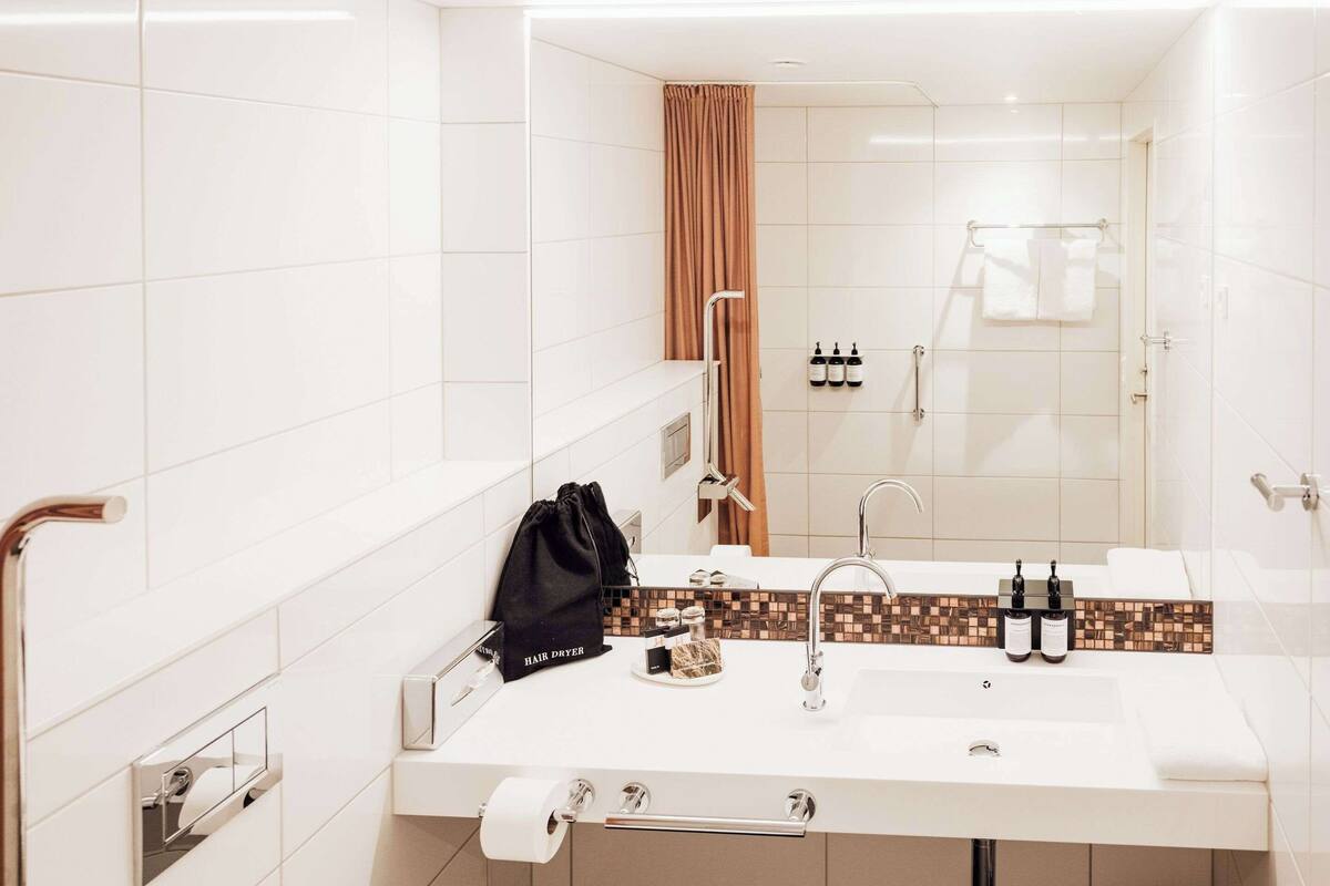 deluxe room | premium bedding, desk, laptop workspace, iron/ironing board