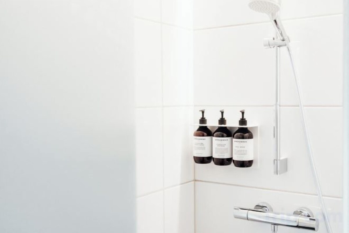 Hair dryer, slippers, towels, soap