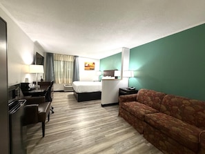 Suite, 1 Queen Bed, Non Smoking | Desk, laptop workspace, iron/ironing board, cribs (free)