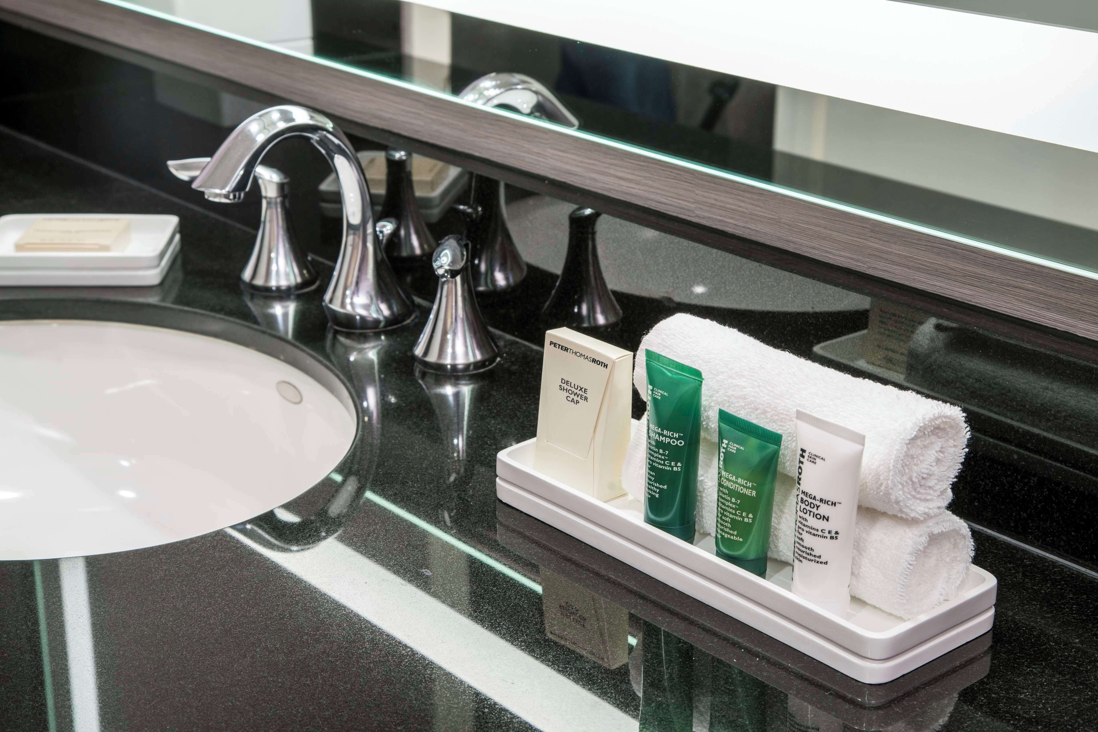 combined shower/bathtub, free toiletries, hair dryer, towels