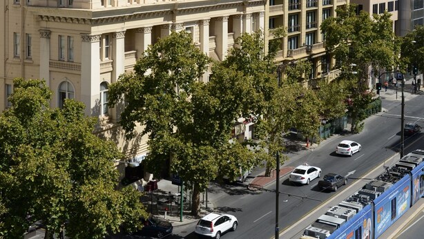 A multi-story building with a classic architectural style, featuring large windows and balconies. - Grosvenor Hotel Adelaide by Accor (Adelaide)