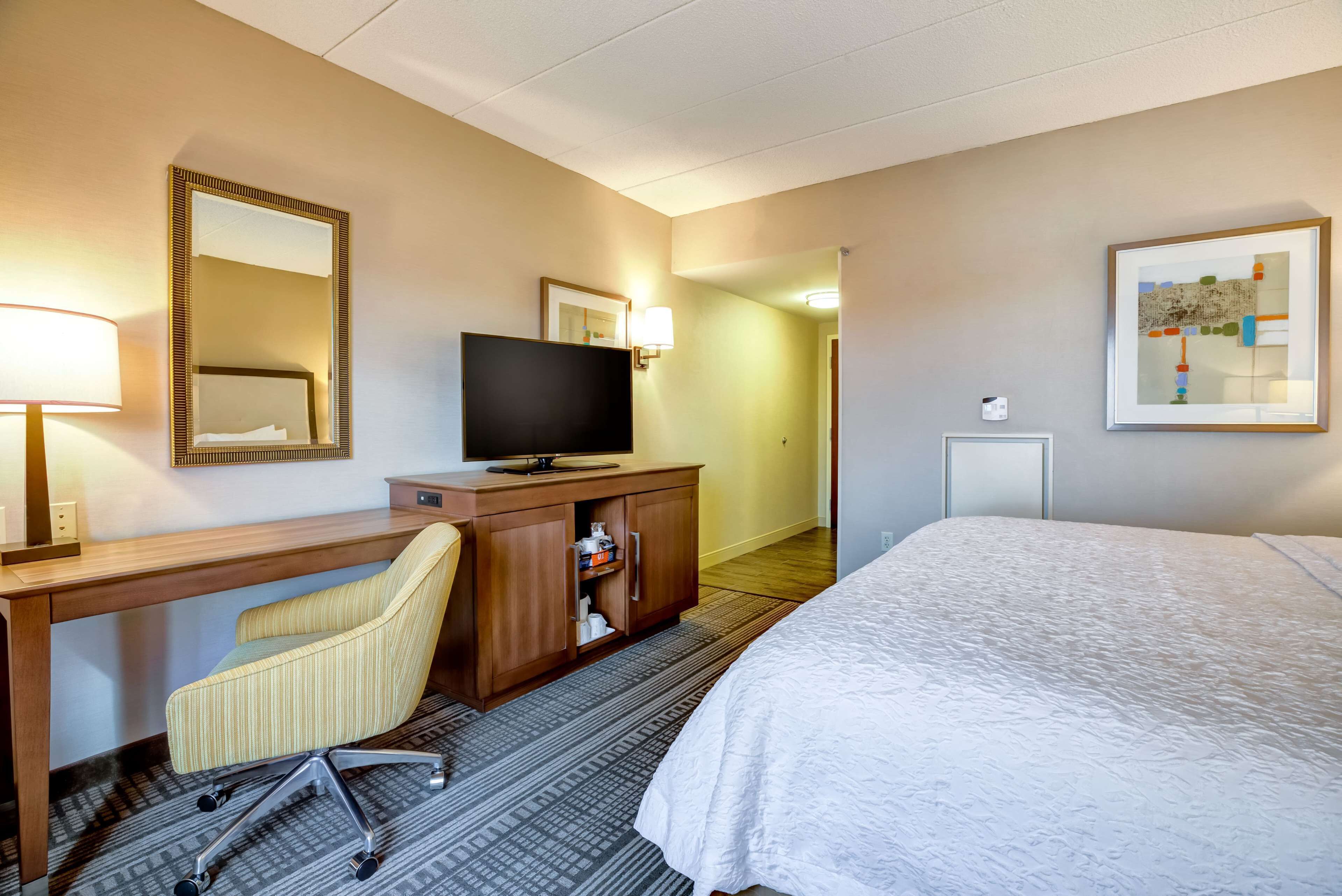 premium bedding, pillow-top beds, desk, laptop workspace
