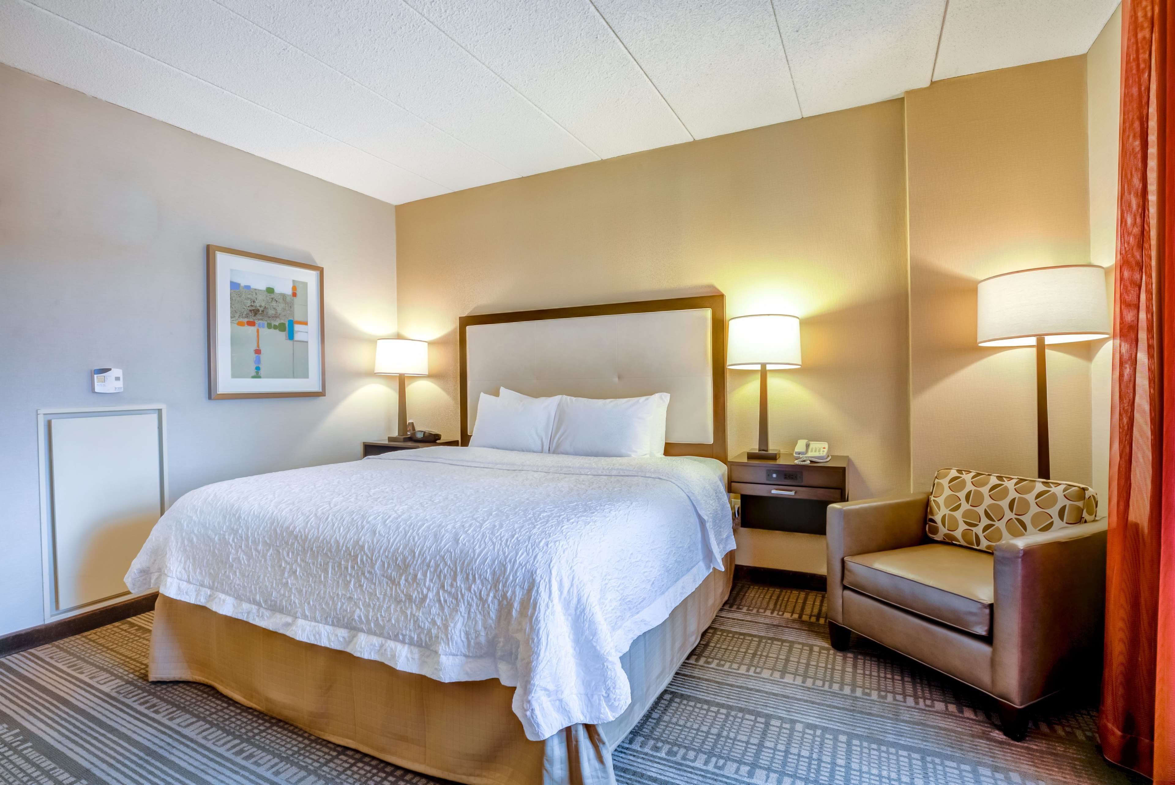 Premium bedding, pillow-top beds, desk, laptop workspace