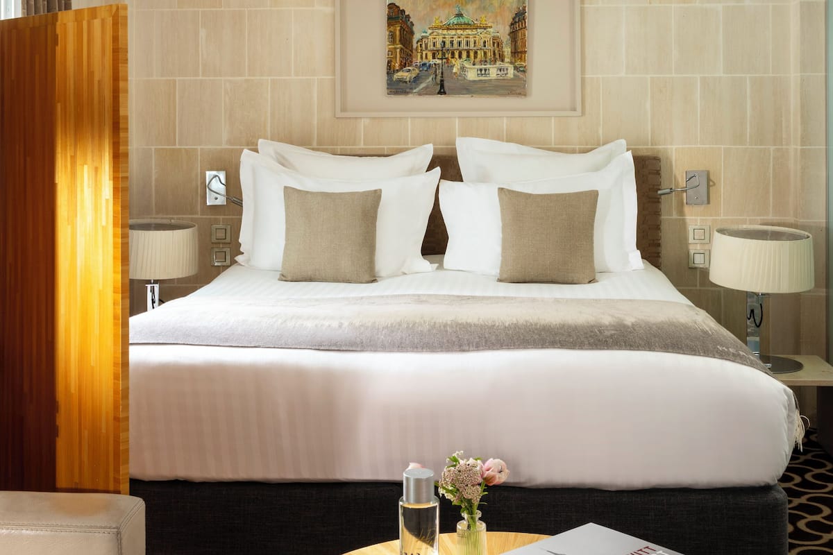 Deluxe Suite (Parisienne) | Premium bedding, minibar, in-room safe, individually decorated