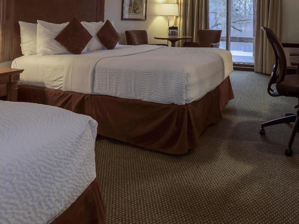 Premium bedding, pillowtop beds, desk, laptop workspace