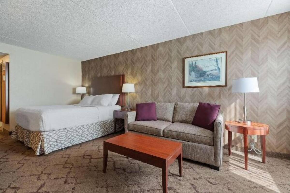 Premium bedding, pillow-top beds, desk, laptop workspace