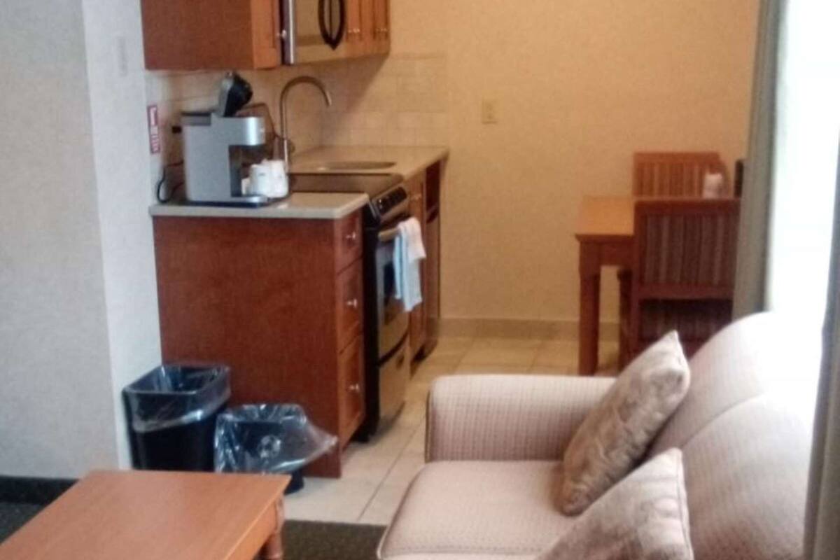 standard room, 1 queen bed, kitchenette, river view | room amenity