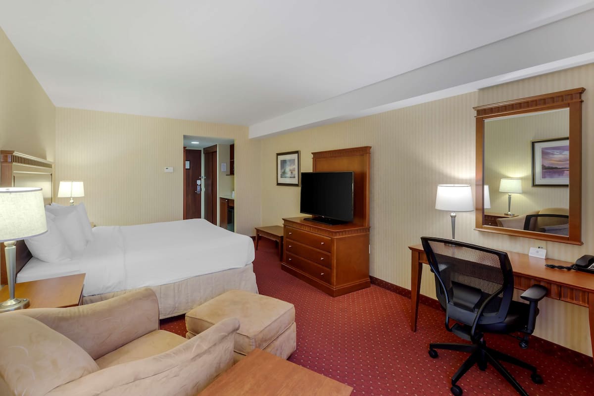 Premium bedding, pillow-top beds, desk, laptop workspace