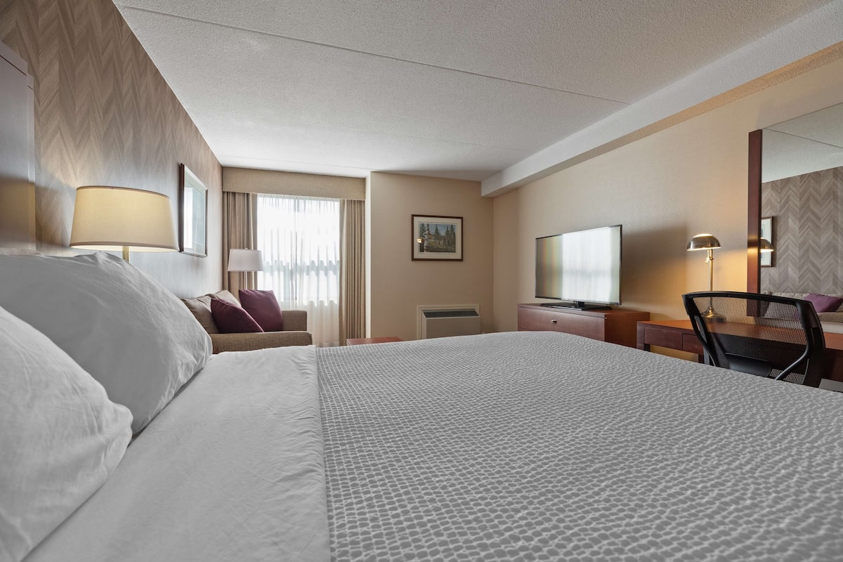 Premium bedding, pillow-top beds, desk, laptop workspace