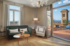 Panoramic Suite, 1 King Bed, Terrace | Living room | Flat-screen TV