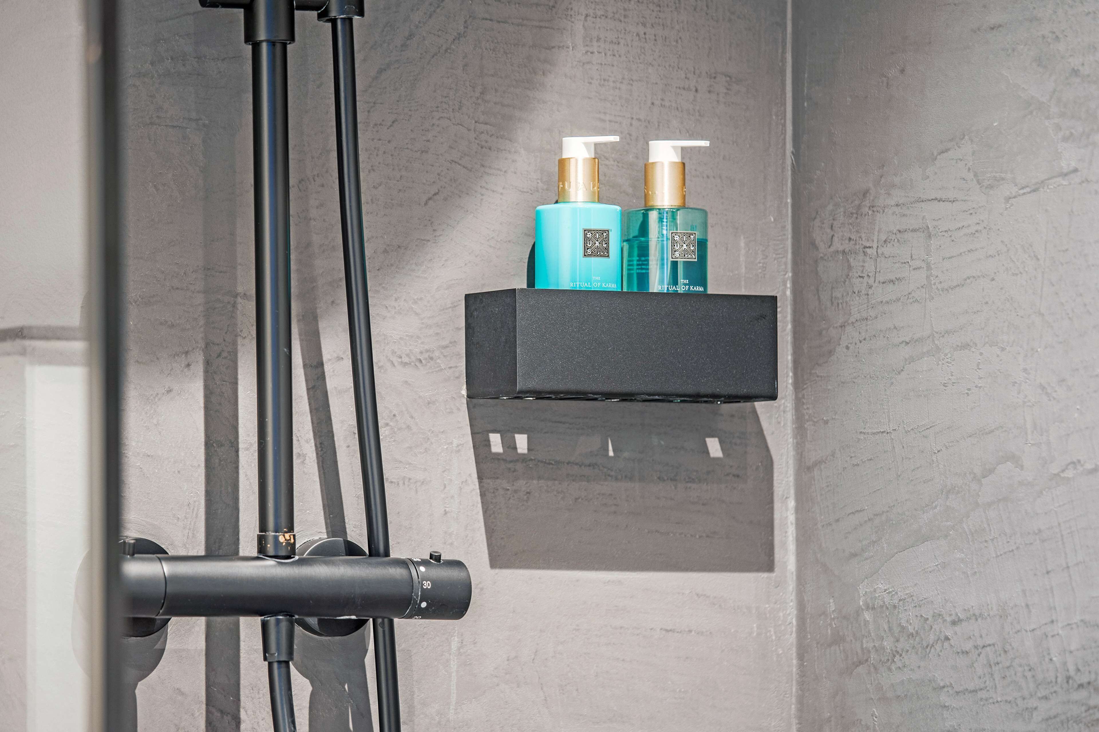 designer toiletries, hair dryer, heated floors, towels