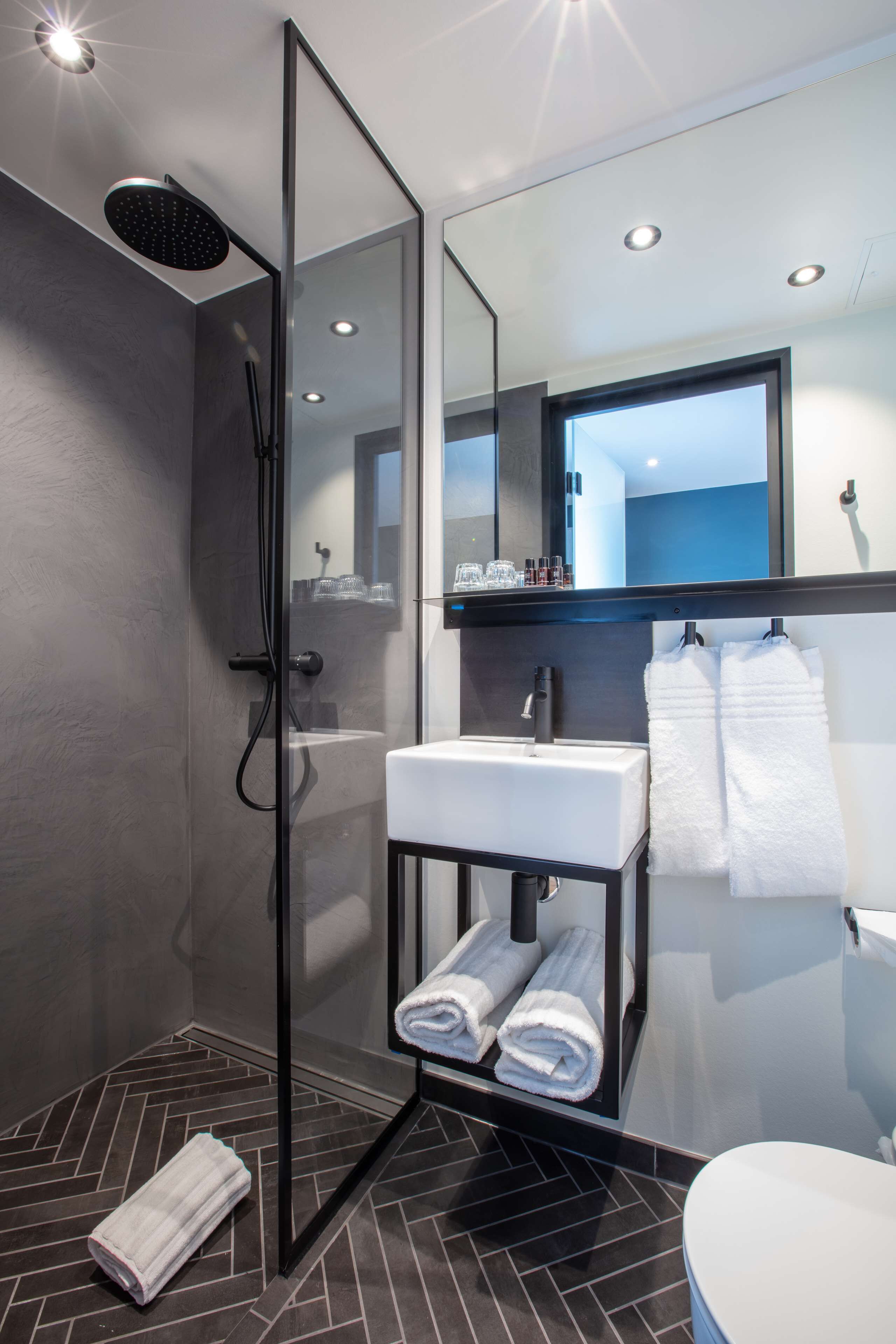 premium room, 1 king bed, non smoking | bathroom | designer toiletries, hair dryer, heated floors, towels