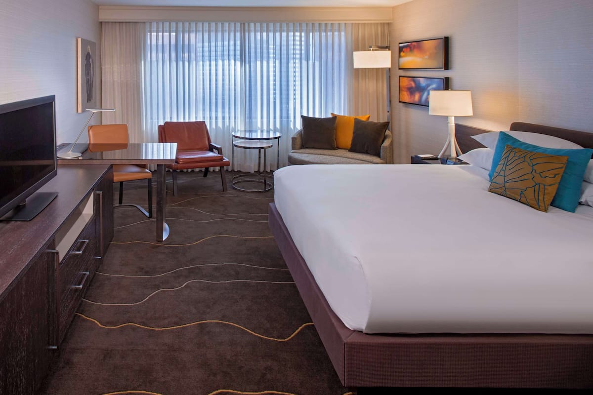 Premium bedding, down duvets, pillow-top beds, in-room safe