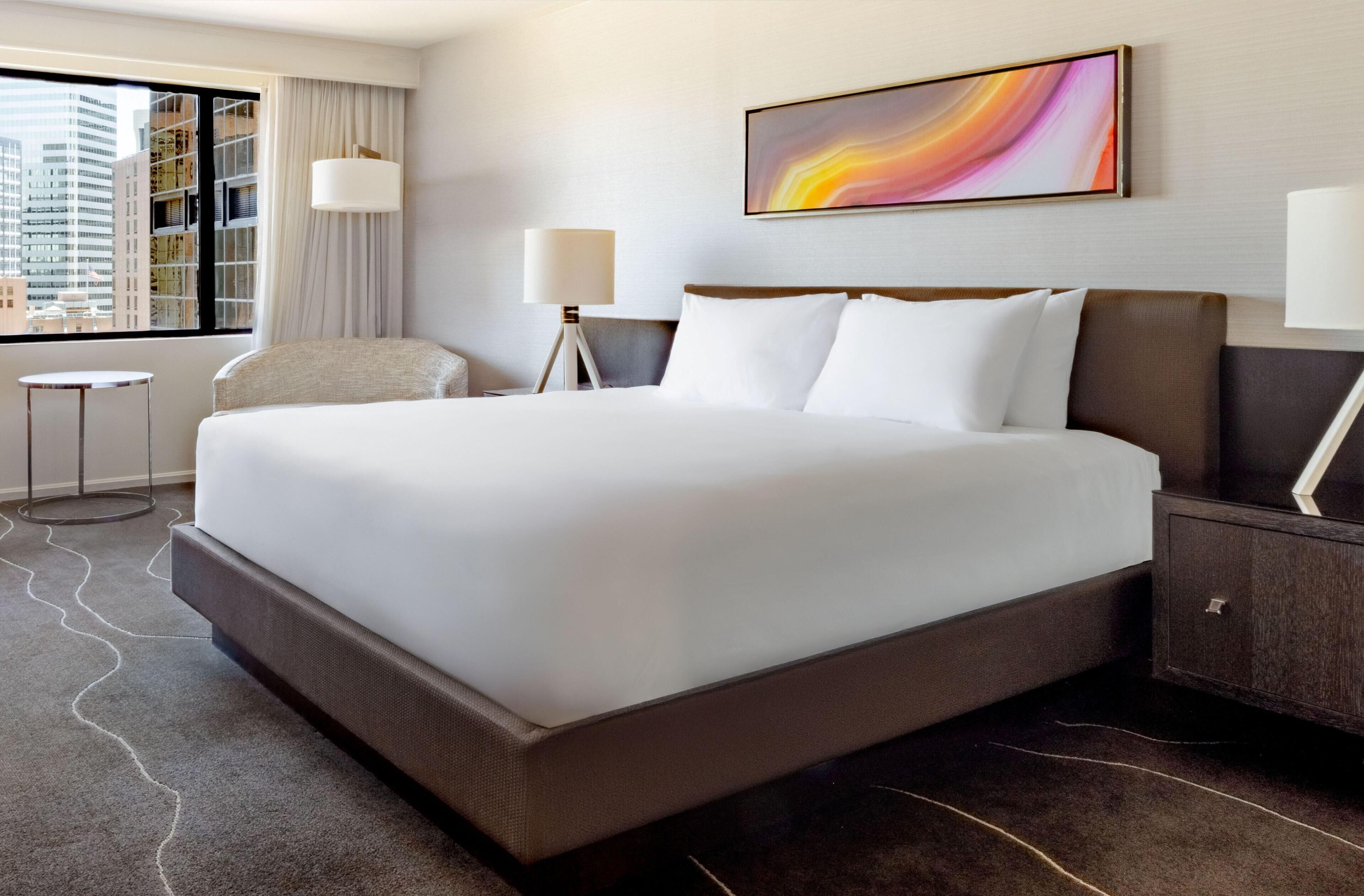 Premium bedding, down comforters, pillowtop beds, in-room safe