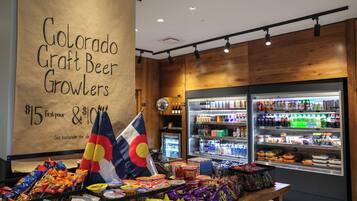 A Colorado Craft Beer Growlers display with a price tag of $15 first pour and $10.