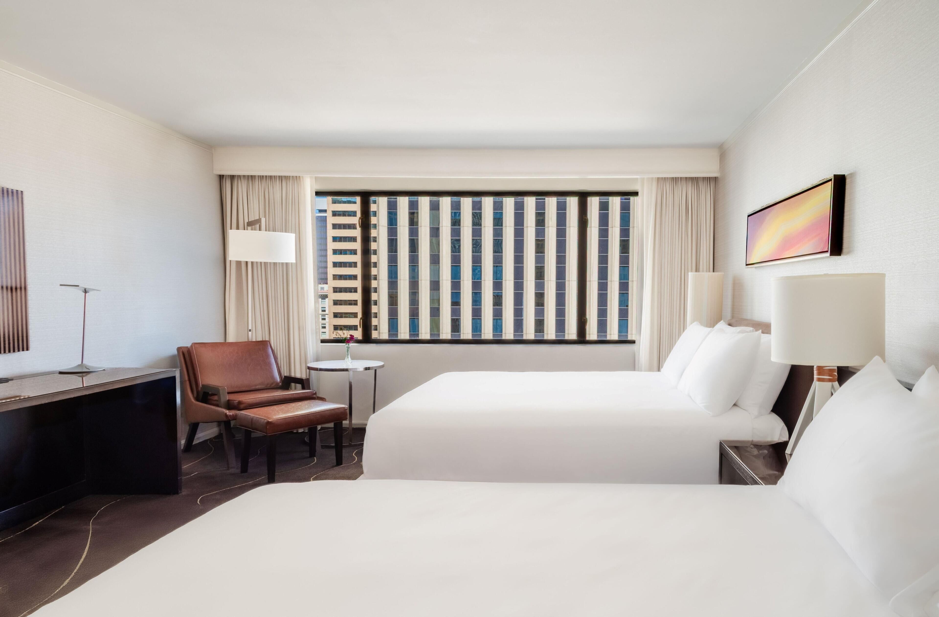 Premium bedding, down comforters, pillowtop beds, in-room safe