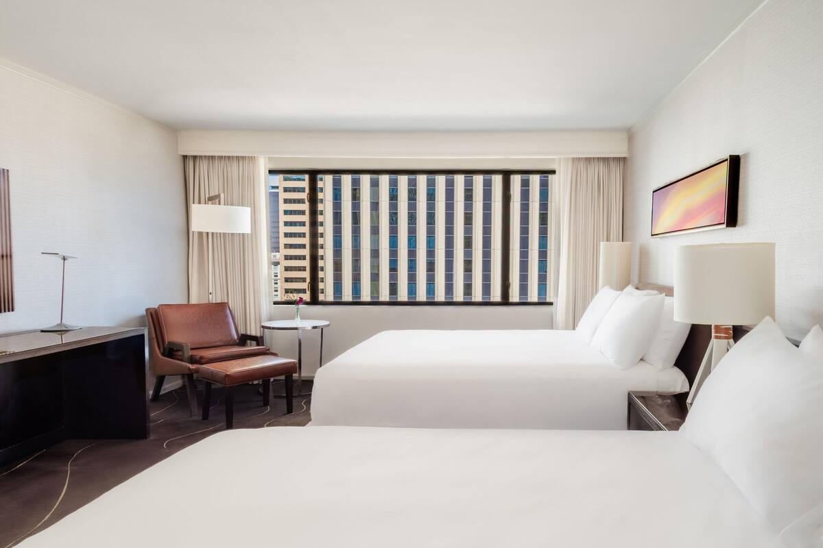 Premium bedding, down comforters, pillowtop beds, in-room safe