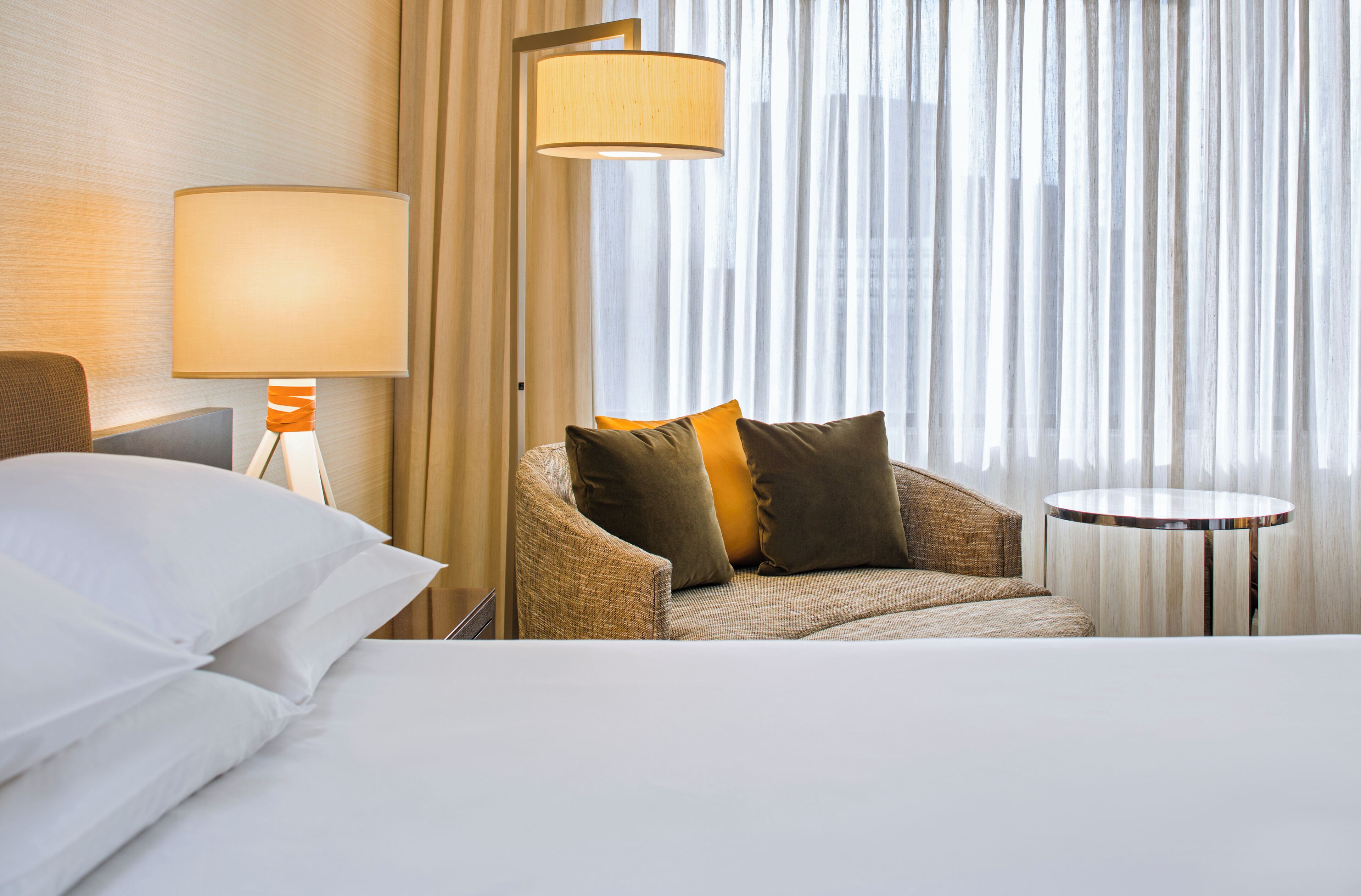 premium bedding, down duvets, pillow-top beds, in-room safe