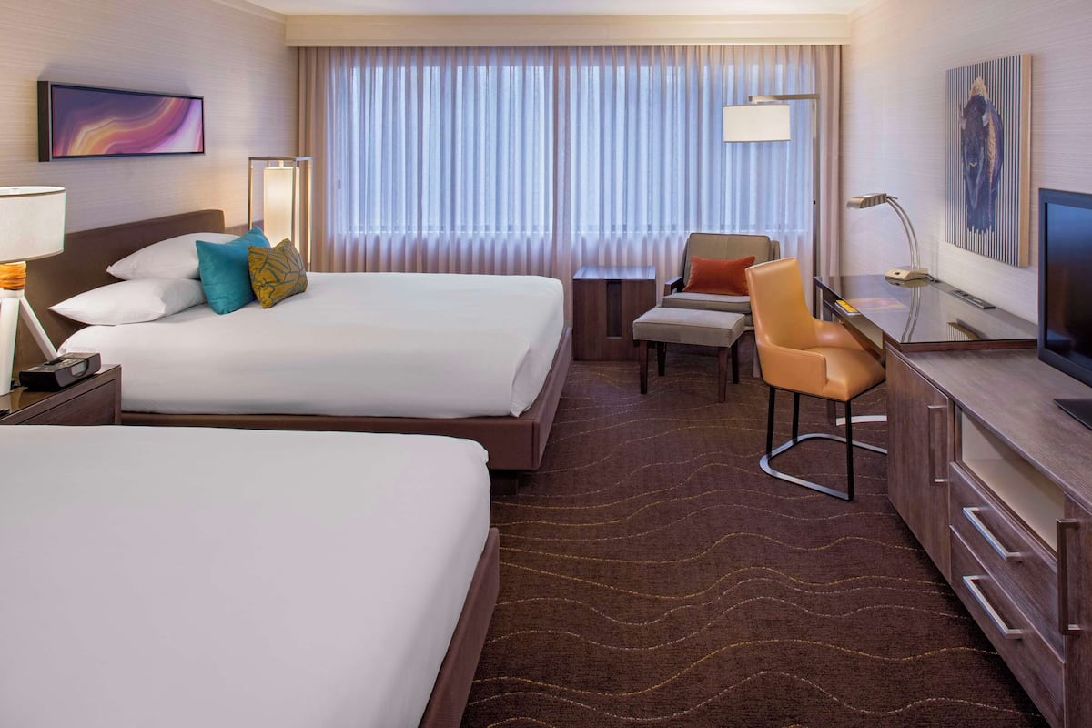 Premium bedding, down duvets, pillow-top beds, in-room safe