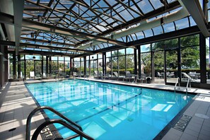 Indoor pool, open 6:00 AM to 11:00 PM, pool loungers