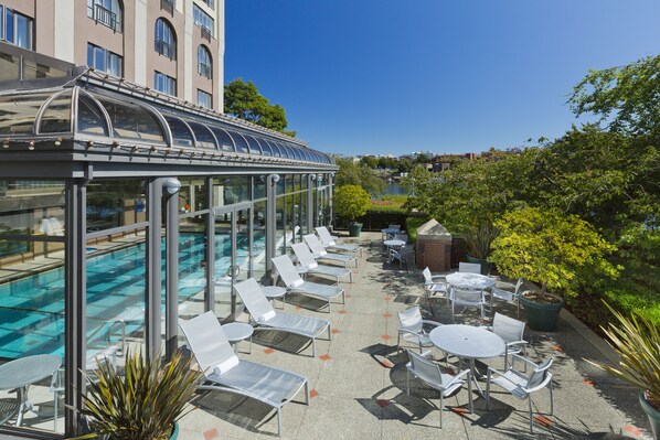 Indoor pool, open 6:00 AM to 11:00 PM, pool loungers