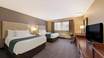 Premium bedding, blackout drapes, iron/ironing board, Internet