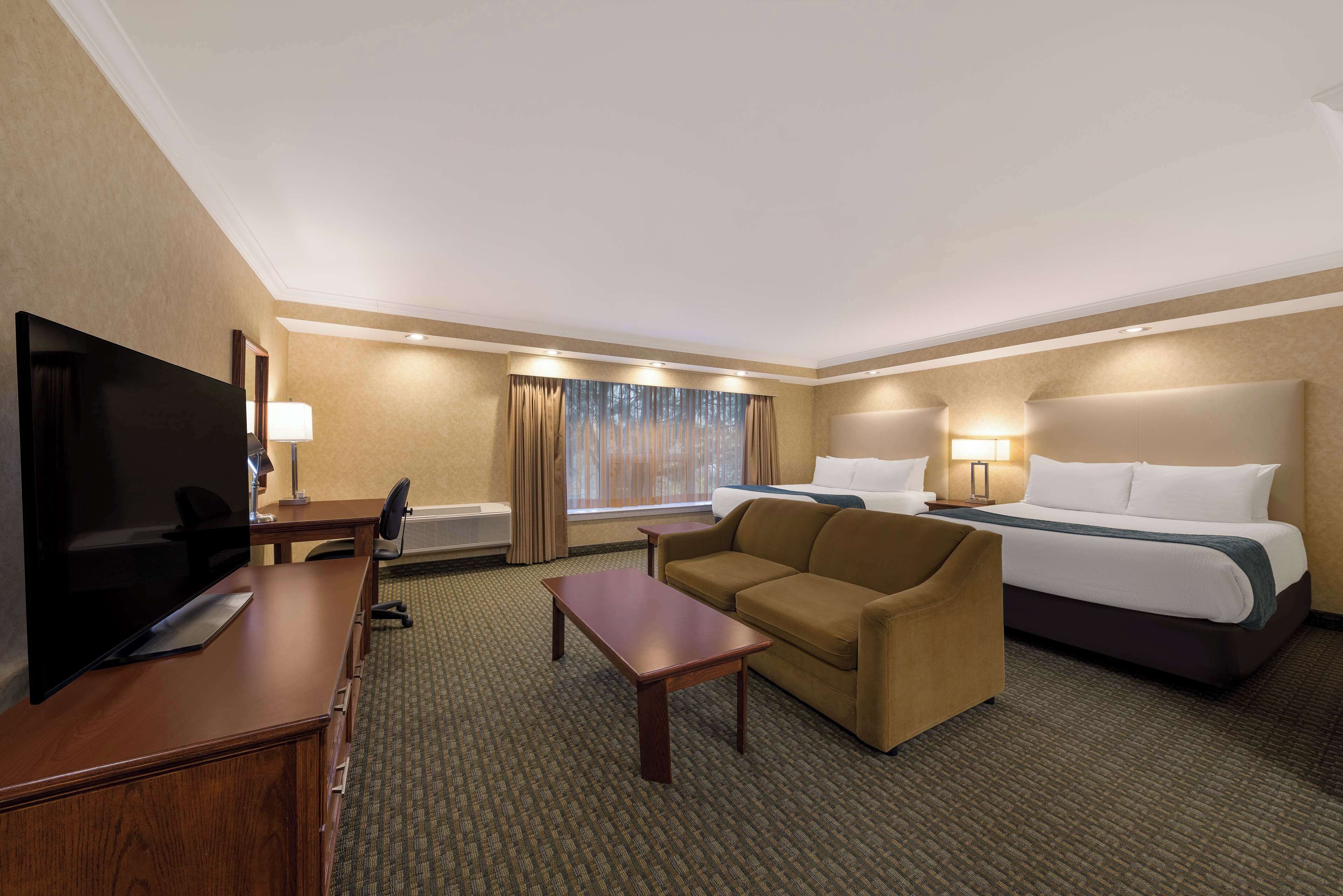 premium bedding, blackout curtains, iron/ironing board, travel cot