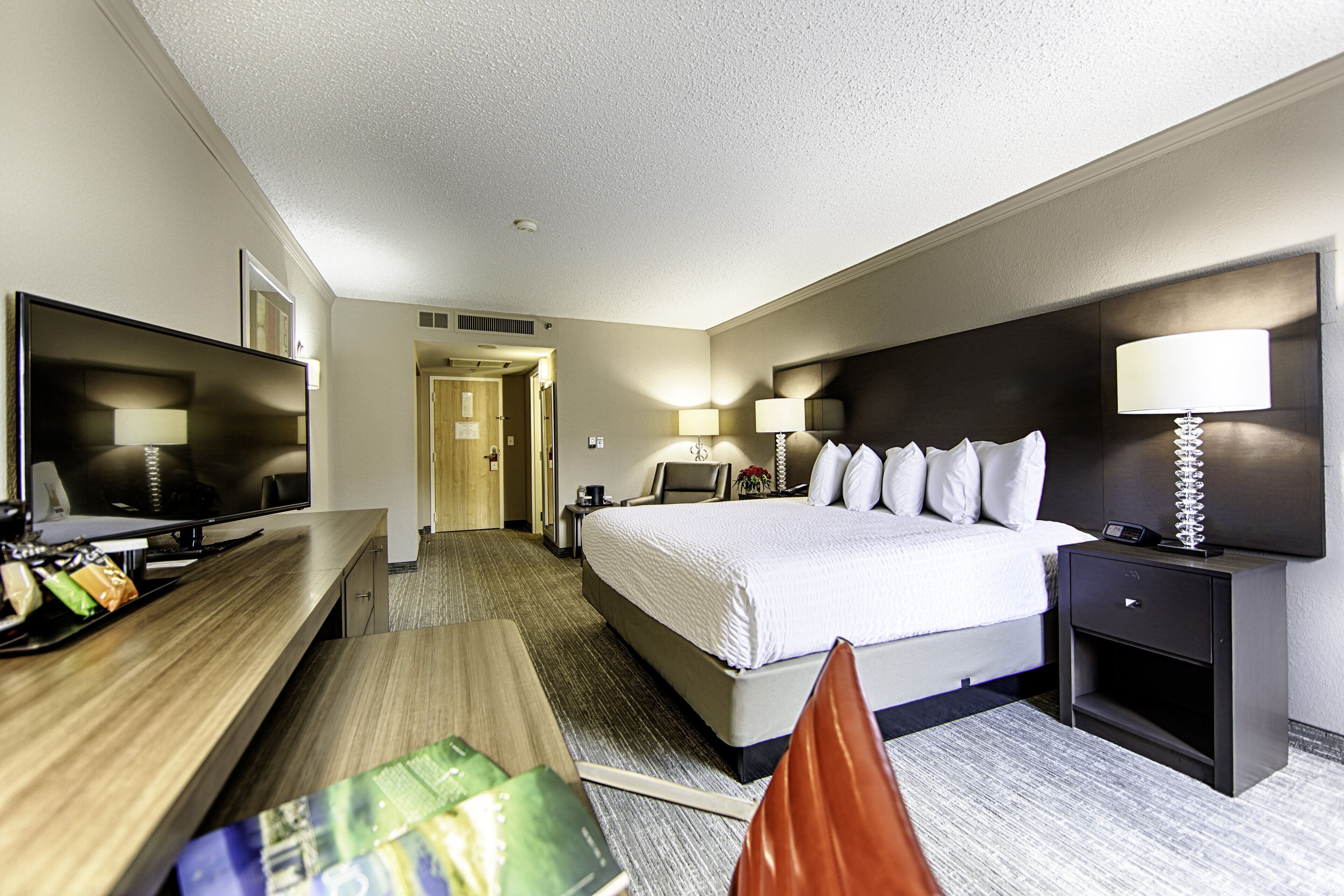 premium bedding, desk, laptop workspace, blackout curtains