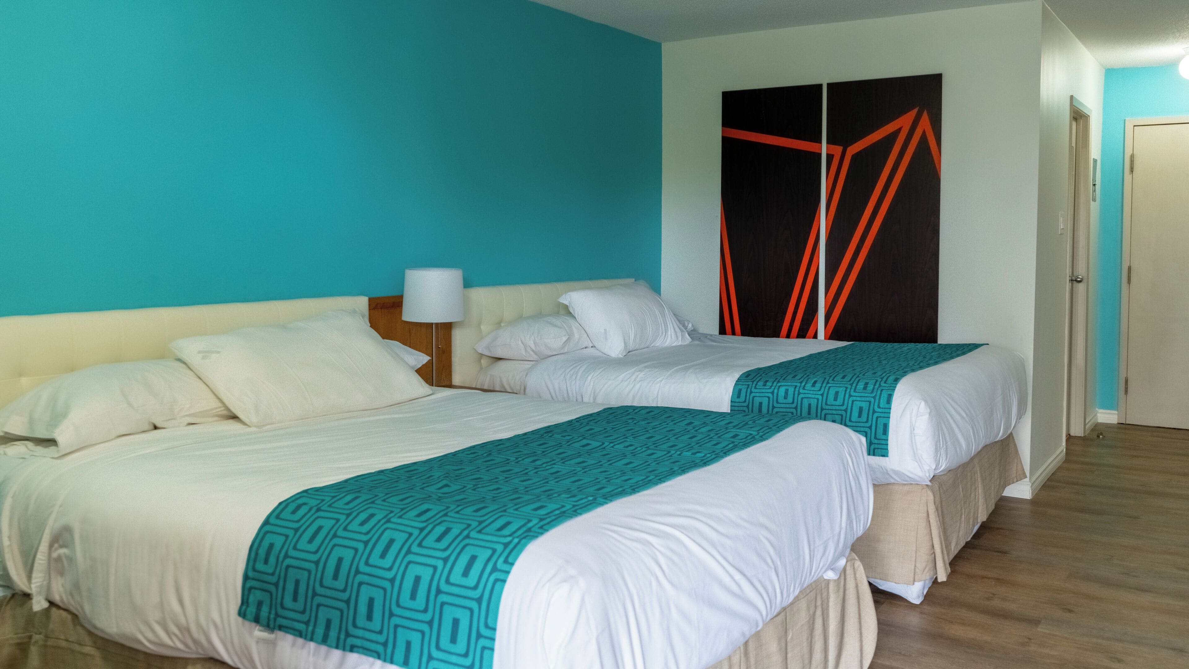 Desk, blackout drapes, iron/ironing board, rollaway beds