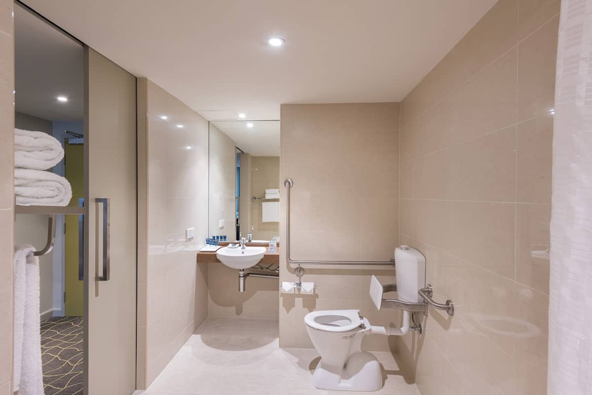 room, 1 king bed | bathroom | shower, free toiletries, hair dryer, towels