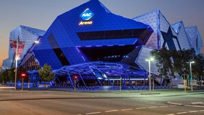 A modern, geometric building with a prominent RAC Arena sign.