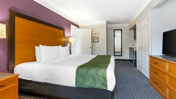 Premium bedding, desk, laptop workspace, iron/ironing board