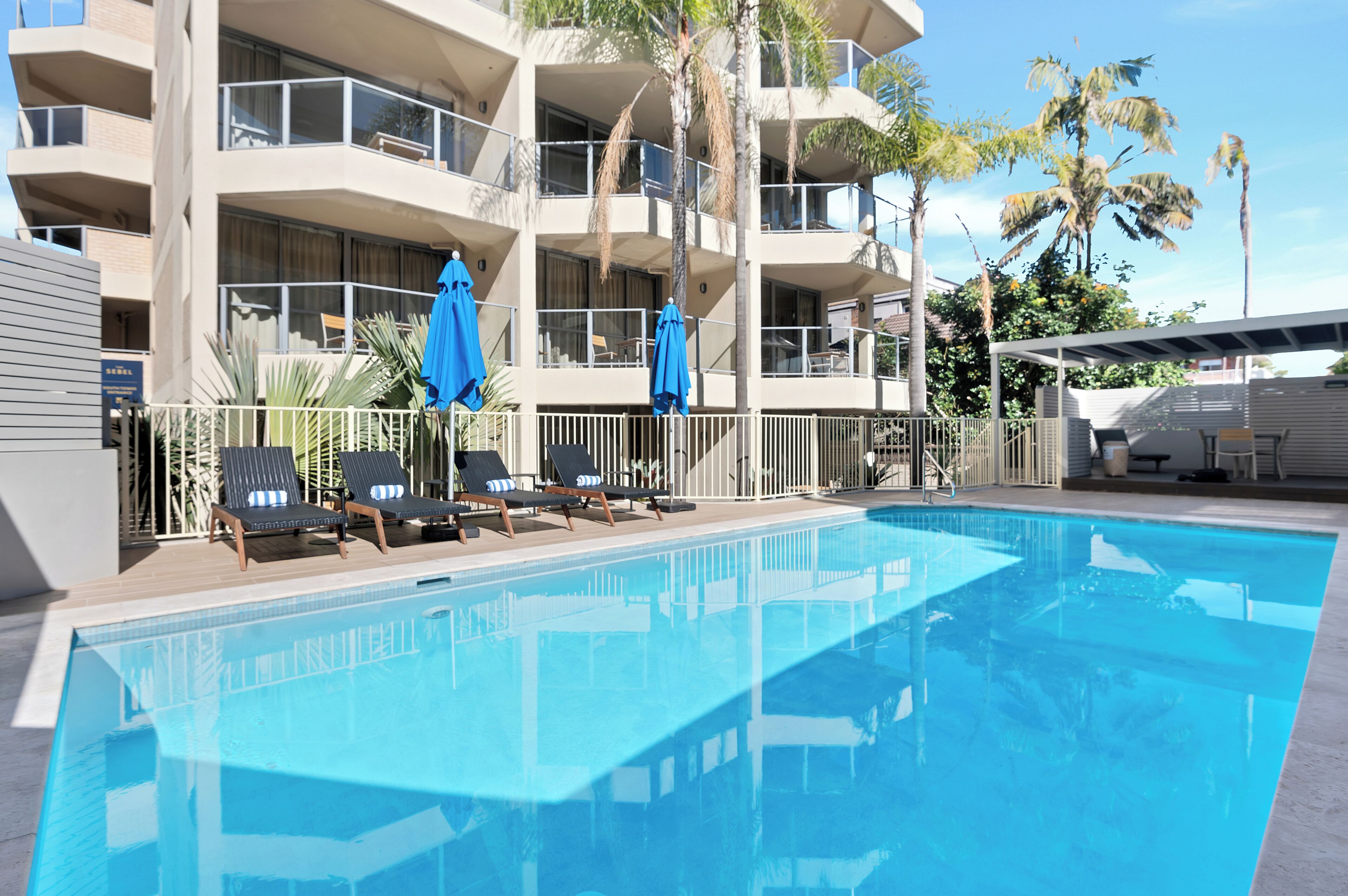 2 outdoor pools, pool umbrellas, pool loungers