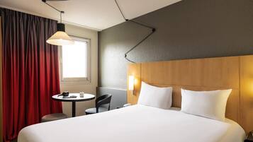 Premium bedding, desk, blackout curtains, soundproofing