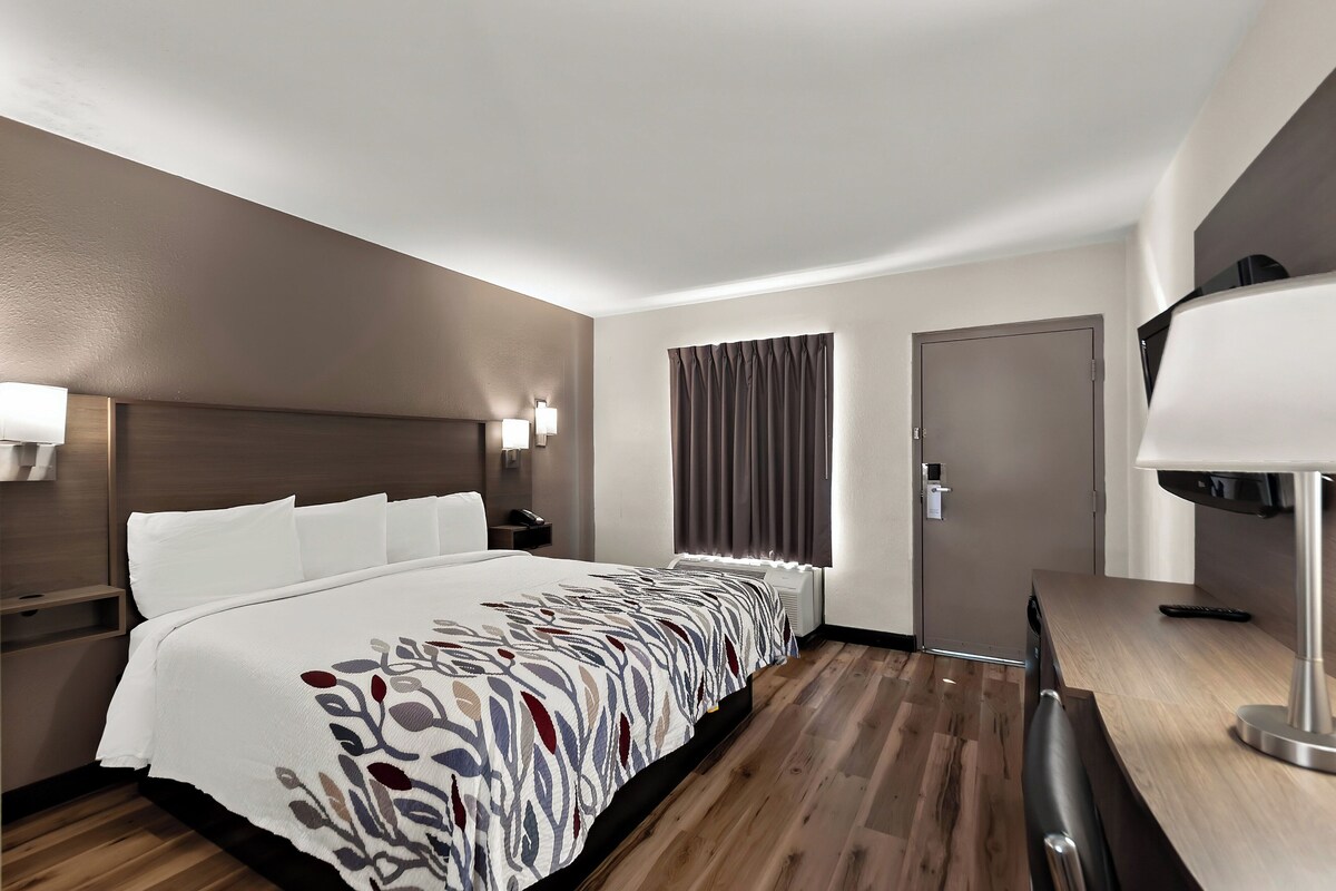 Desk, blackout drapes, cribs (free), WiFi (free)