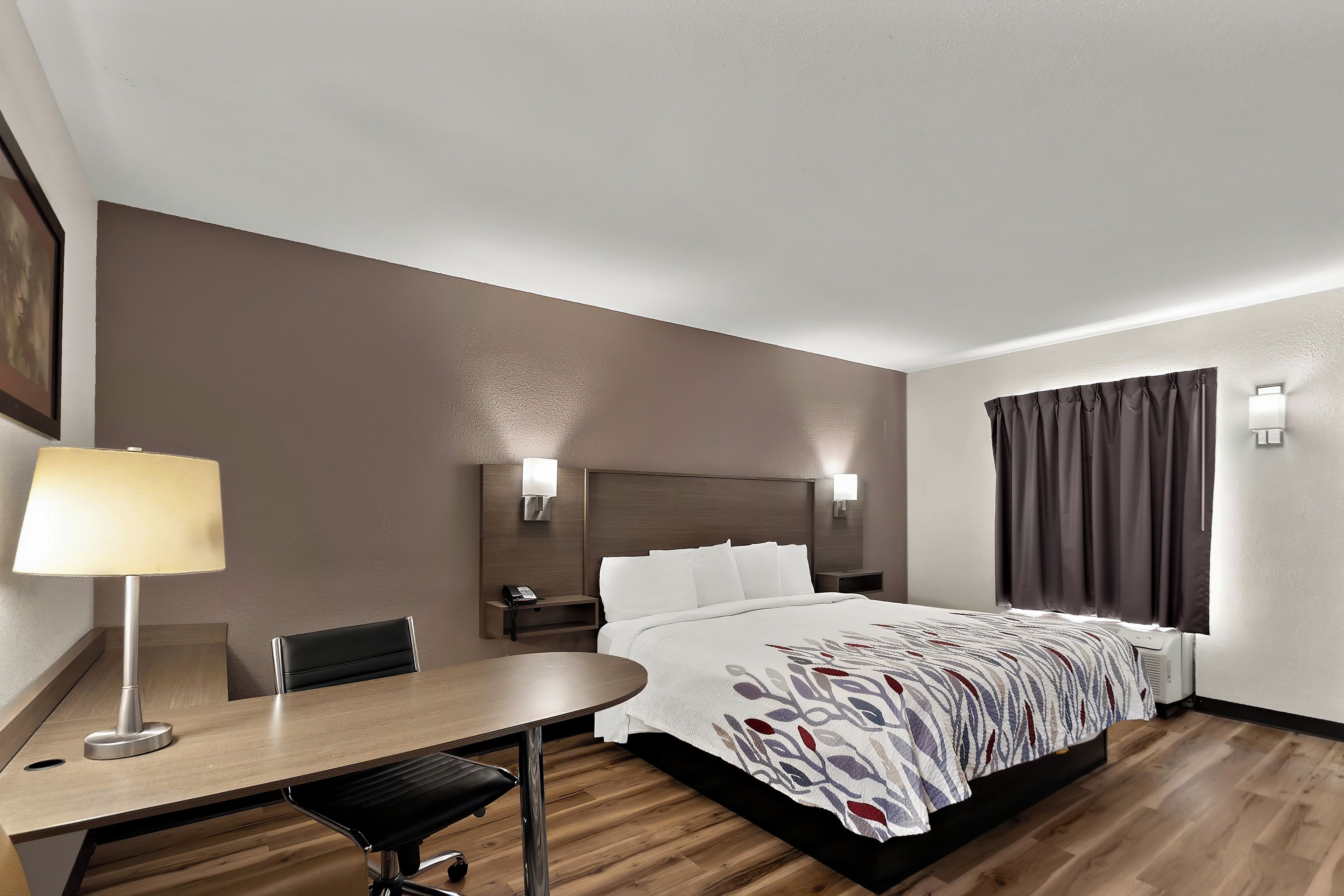 Desk, blackout drapes, cribs (free), WiFi (free)