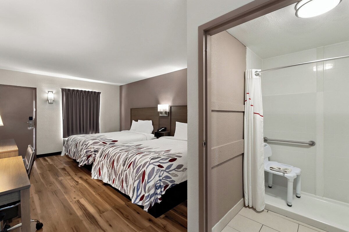 Deluxe Room, 2 Queen Beds, Accessible, Non Smoking (Walk-In Shower, First Floor) | Desk, blackout drapes, cribs (free), WiFi (free)