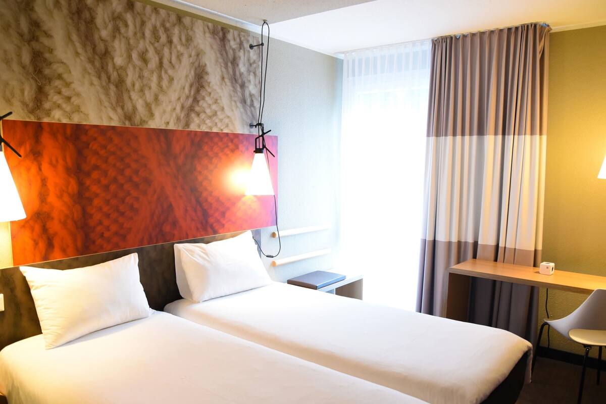 Hypo-allergenic bedding, desk, blackout curtains, soundproofing