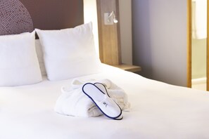 Premium bedding, desk, blackout curtains, soundproofing