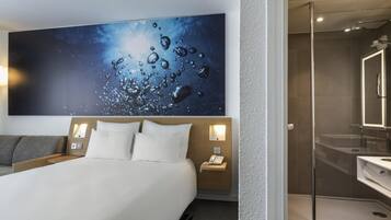 Premium bedding, desk, blackout drapes, soundproofing