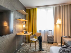 Premium bedding, desk, blackout curtains, soundproofing