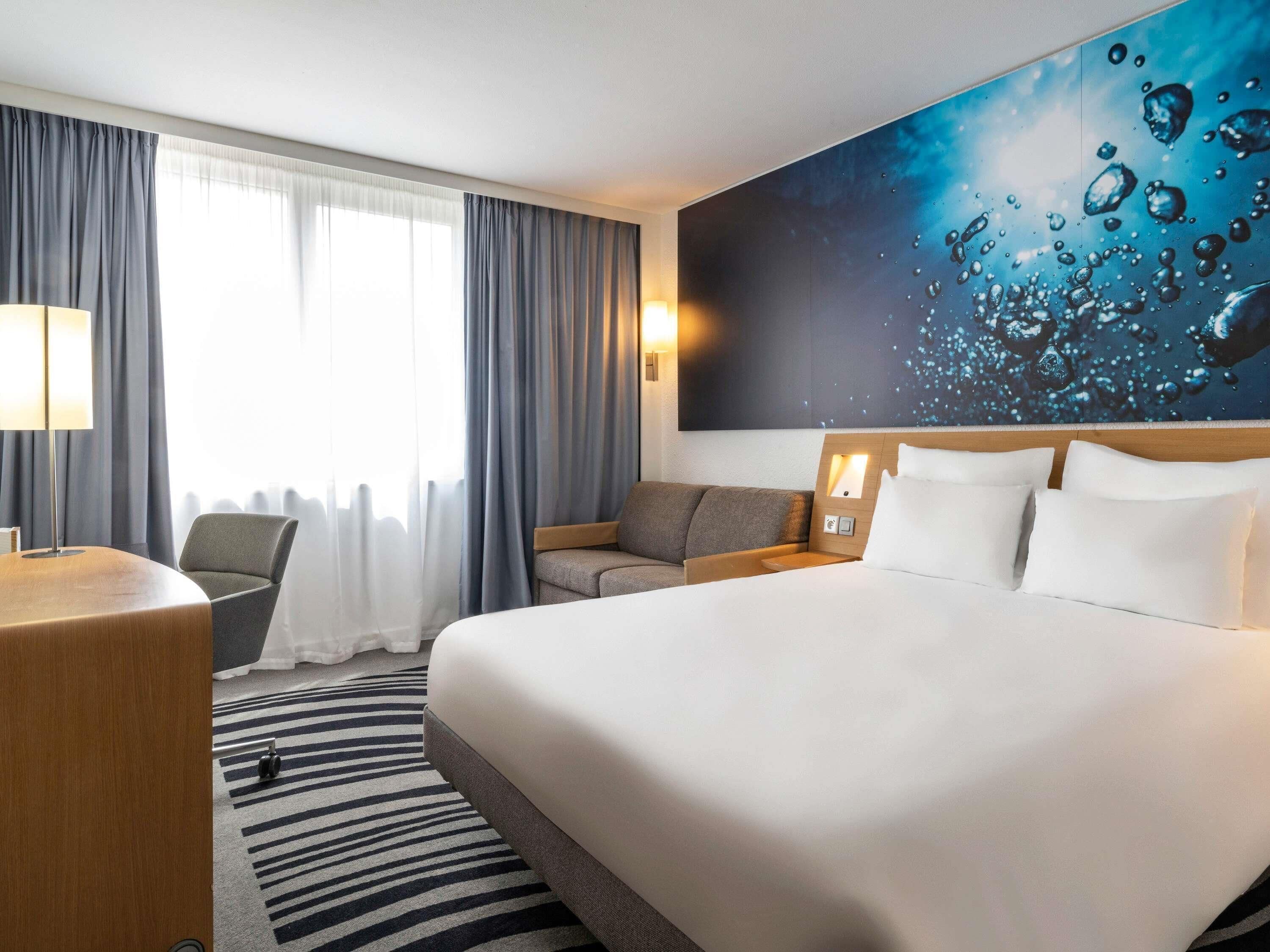 Premium bedding, desk, blackout drapes, soundproofing