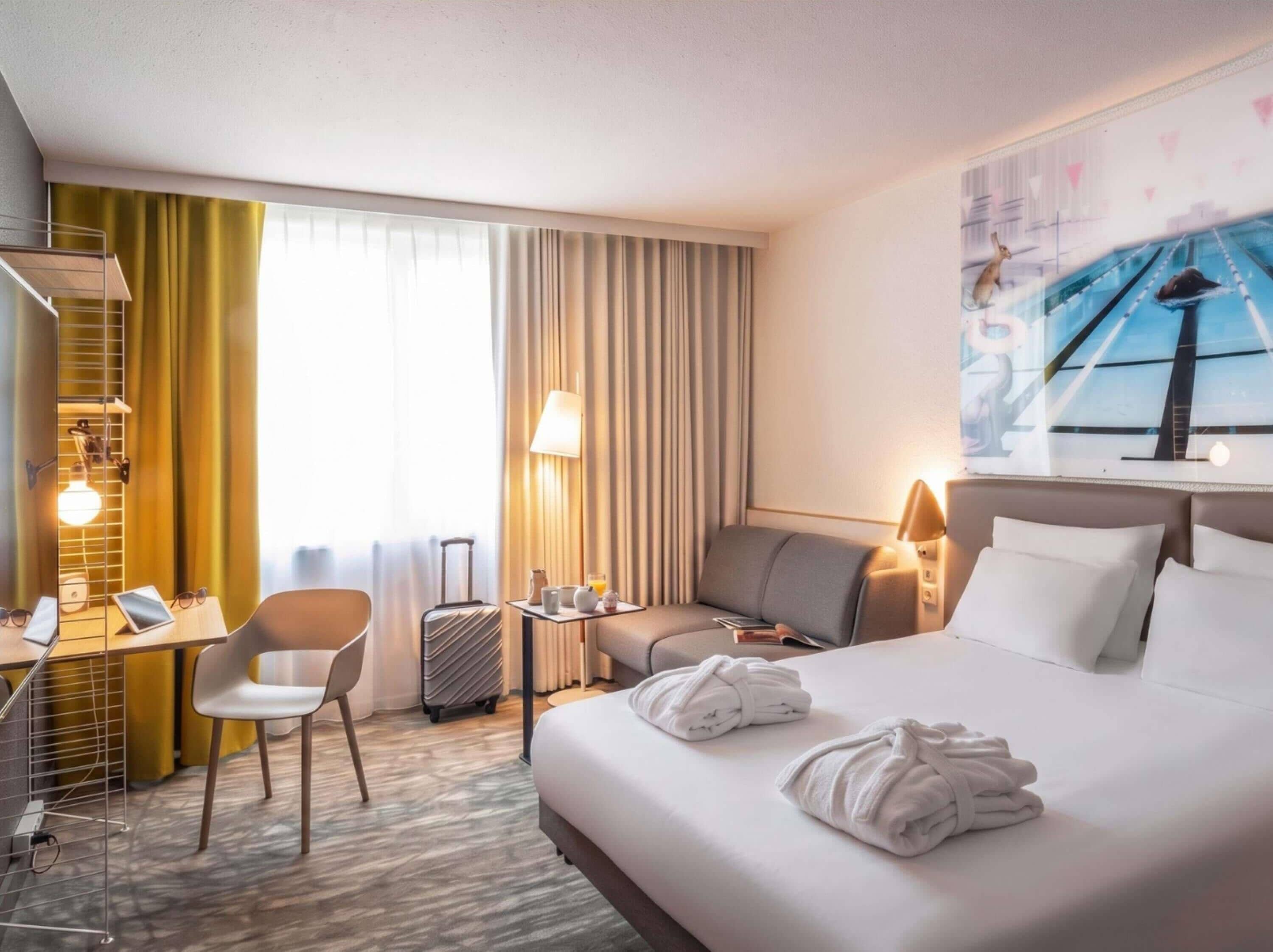 Premium bedding, desk, blackout curtains, soundproofing